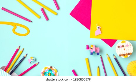 Children Art Concept Colorful Flat Lay.Work Kids Desk With Craft Supplies Top View. Children Education Themed Photo.