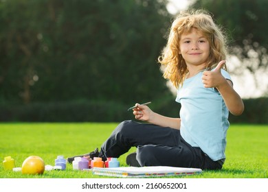 Children Artist Paints Creativity Vacation, Kids Crafts. Schooler Kids Drawing In Summer Park, Painting Art. Little Painter Draw Pictures Outdoor.