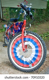 Children Bike Decorated In American Flags Prepared For 4th July Parade