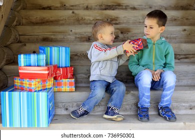 children and boxes with gifts. the concept of conjecture. Holiday scene