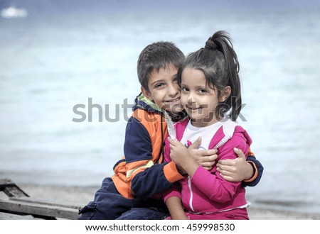 Similar – Mother with her seven year old daughter laughing in a cabin in the countryside