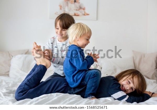 Children Brothers Playing Home Tickling Feet Stock Photo 1568525671 ...