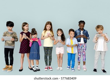 Children Browsing Digital Devices Concept