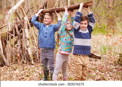 Children Building Camp In Forest Together - Powered by Shutterstock