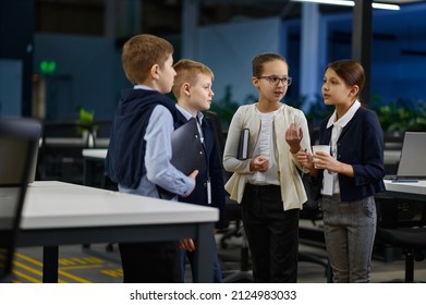 Children business team discussing work in office - Powered by Shutterstock