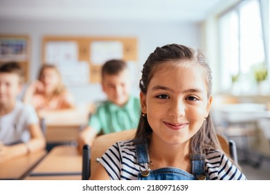 Children in the classroom at the lesson. Portrait of face pupil girl of elementary school. - Powered by Shutterstock