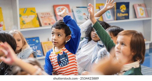 Children in a classroom raising hands, eager to participate. Diverse group of kids, engaged in learning. Classroom setting with books in the background. Little diverse kids raising hands in classroom. - Powered by Shutterstock