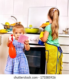 Children Cleaning  Kitchen. Housekeeping.