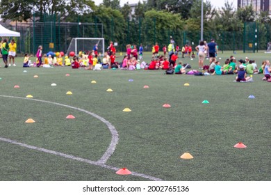 Children Competing During School Sports Day In The UK. Blurred Image With Selective Focus.