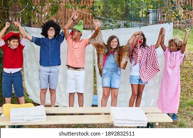 Children In Costume At The End Of The Talent Show In The Holiday Camp Are Happy About The Performance