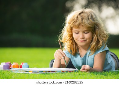 Children Create Artist Paints Creativity Vacation. Schooler Kids Drawing In Summer Park, Painting Art. Little Painter Draw Pictures Outdoor.