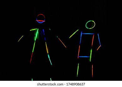 Children Dance In Costumes Made Of Glow Sticks