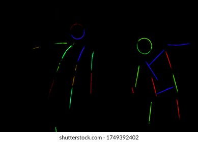 Children Dance In Costumes Made Of Glow Sticks