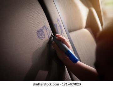 Children drawing and marker pen the car backseats