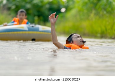 Children drowning the river and blowing whistle show sign for helping and save life 