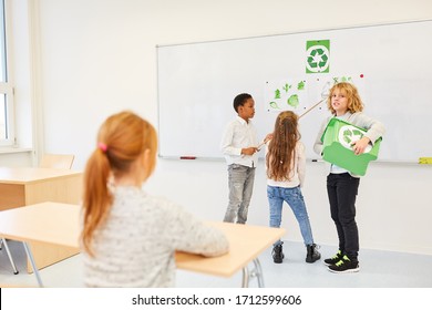 Children in elementary school declare environmental protection and recycling project - Powered by Shutterstock