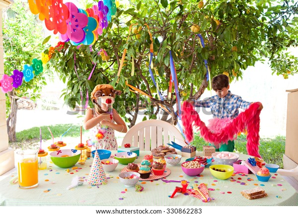 Children Enjoying Bright Colorful Birthday Party Stock Image