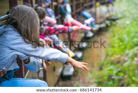 Children enjoying on the train