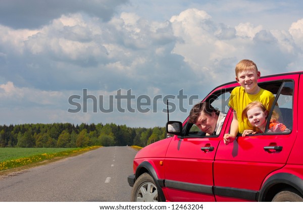 children with father in\
car