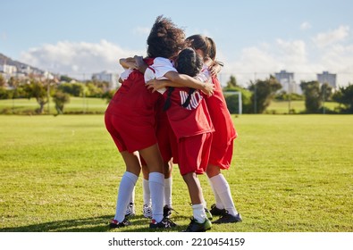 Children, Football Team And Huddle Of Sports Group Together On Soccer Field For Celebration Of Goal, Winning And Teamwork During A Competition Match Outdoors. Youth, Kids Or Girls Before A Tournament