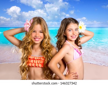 children friends girls happy together in tropical beach vacation