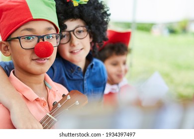 Children In Funny Disguise At Talent Show Appearance In Carnival Or Holiday Camp
