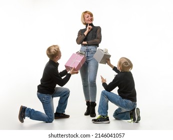 Children Give A Gift To Mom Asking For Forgiveness, Kneeling, White Background