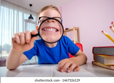 Children Go Back To School. Nerd Pupil With Health White Smile. Positive Attitude. Child In Glasses Showing White Teeth With Big Magnifying Glass. Dental For Preschool And Kindergarten Kids.