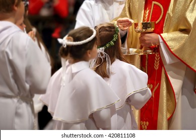 Children going to the first holy communion - Shutterstock ID 420811108