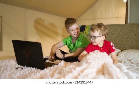 Children Having Fun In The Glamping Tent