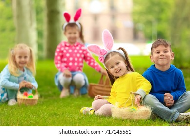 children having fun park easter egg の写真素材 今すぐ編集