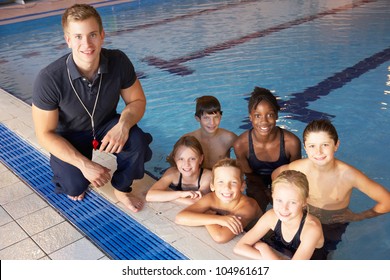 Children Having Swimming Lesson