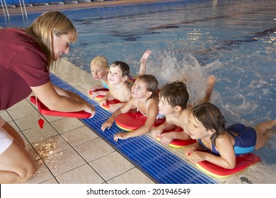 Children Having Swimming Lesson