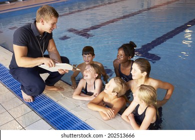 Children Having Swimming Lesson