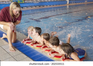 Children Having Swimming Lesson