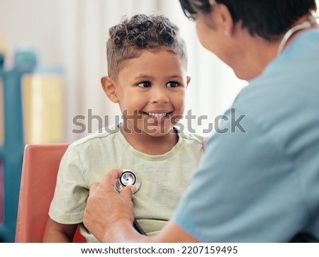 Children, healthcare and stethoscope with a doctor or pediatrician listening to the heartbeat of a boy patient in the hospital. Nurse, medical and trust with a male child and female consultant