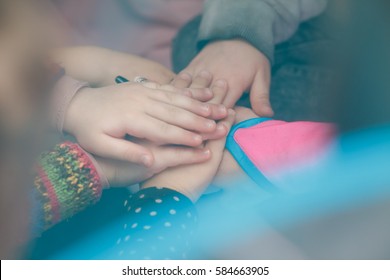 Children holding hands. Community. Game. All together.