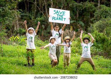 Children join as volunteers for reforestation, earth conservation activities to instill in children a sense of patience and sacrifice, doing good deeds and loving nature. - Shutterstock ID 2087238052