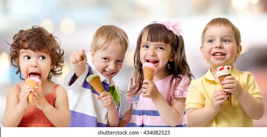 Children Or Kids Group Eating Ice Cream