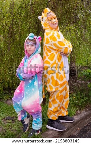 Similar – loving couple in the Park wearing pajamas