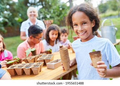 Children Learn About Sowing And Propagating Plants In The Nursery Or At The Holiday Camp