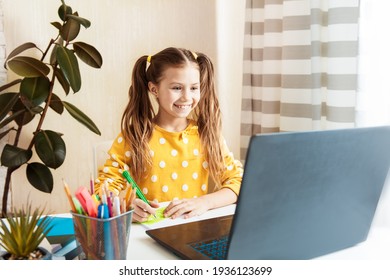 Children Learn English Online At Home. Homeschooling And Distance Education For Kids. Girl Student Study Online With Video Call Teacher