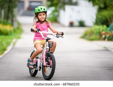 girls riding bikes