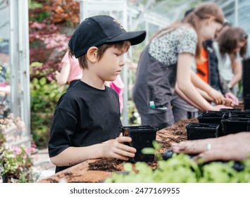 Children Learning Gardening by Planting Seedlings - Powered by Shutterstock