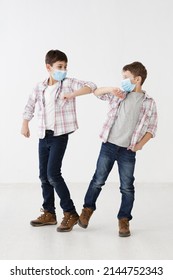 Children With Medical Masks-demonstrating Non Contact Greetings