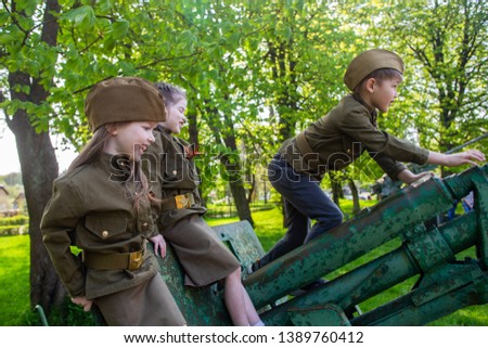 Children in military uniform on holiday day of victory, May 9, Russia