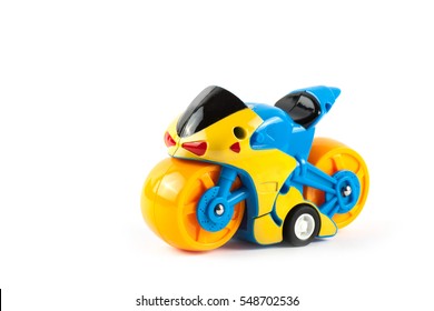 Children motorcycle toy isolated on white background.