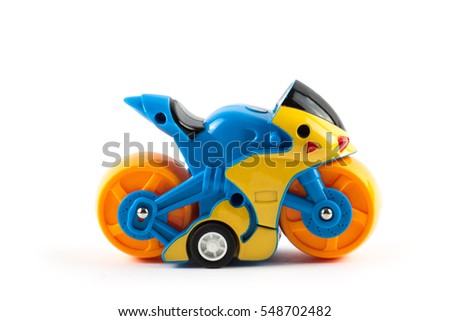 Children motorcycle toy isolated on white background.