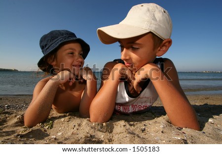 Similar – Vater und Sohn sitzen im Park.