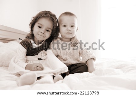 Similar – Little girl holding cookie sitting over the bed